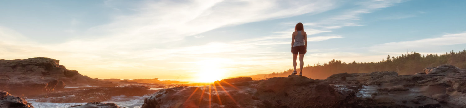 Adventurous Woman Hiking at Botanical Beach on the West Coast